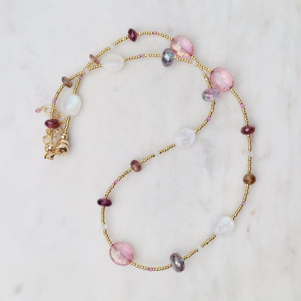 
                      
                        NKL-VRM Gold Glass Necklace with Moonstone, Pink Sapphires
                      
                    