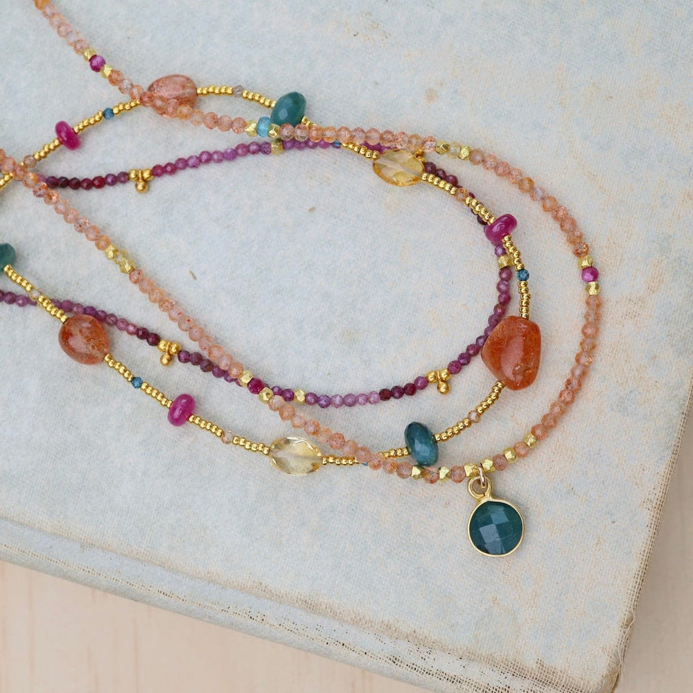 
                      
                        NKL-VRM Gold Glass, Sunstone, Grandidierite Ruby Necklace
                      
                    