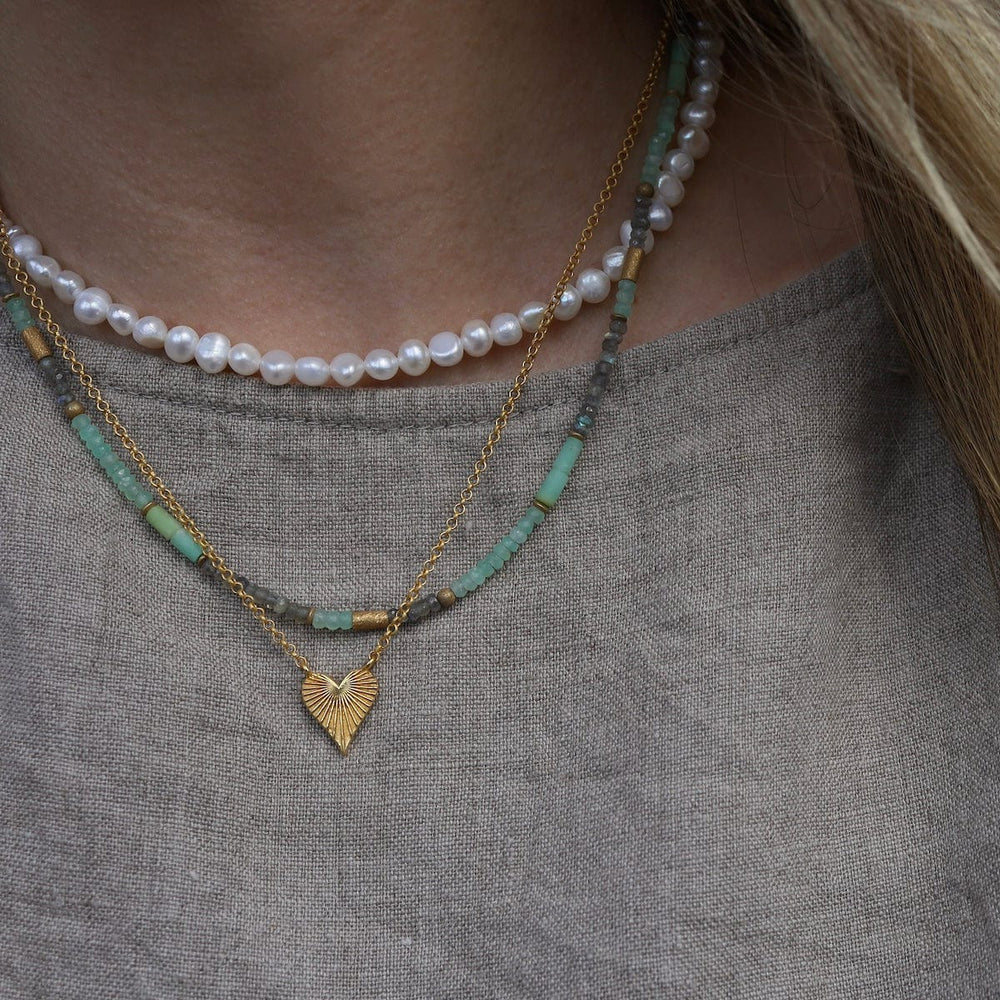 
                  
                    NKL-VRM Heart of Joy Necklace
                  
                