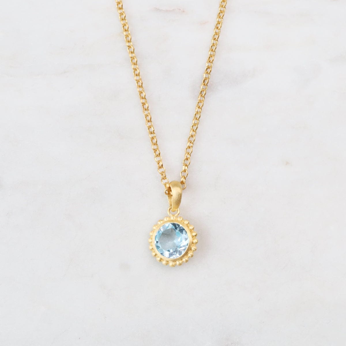 NKL-VRM Karma Blue Topaz Pendant Necklace