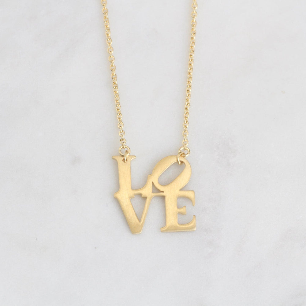 
                      
                        NKL-VRM Matte Gold Vermeil LOVE Sculpture Necklace
                      
                    