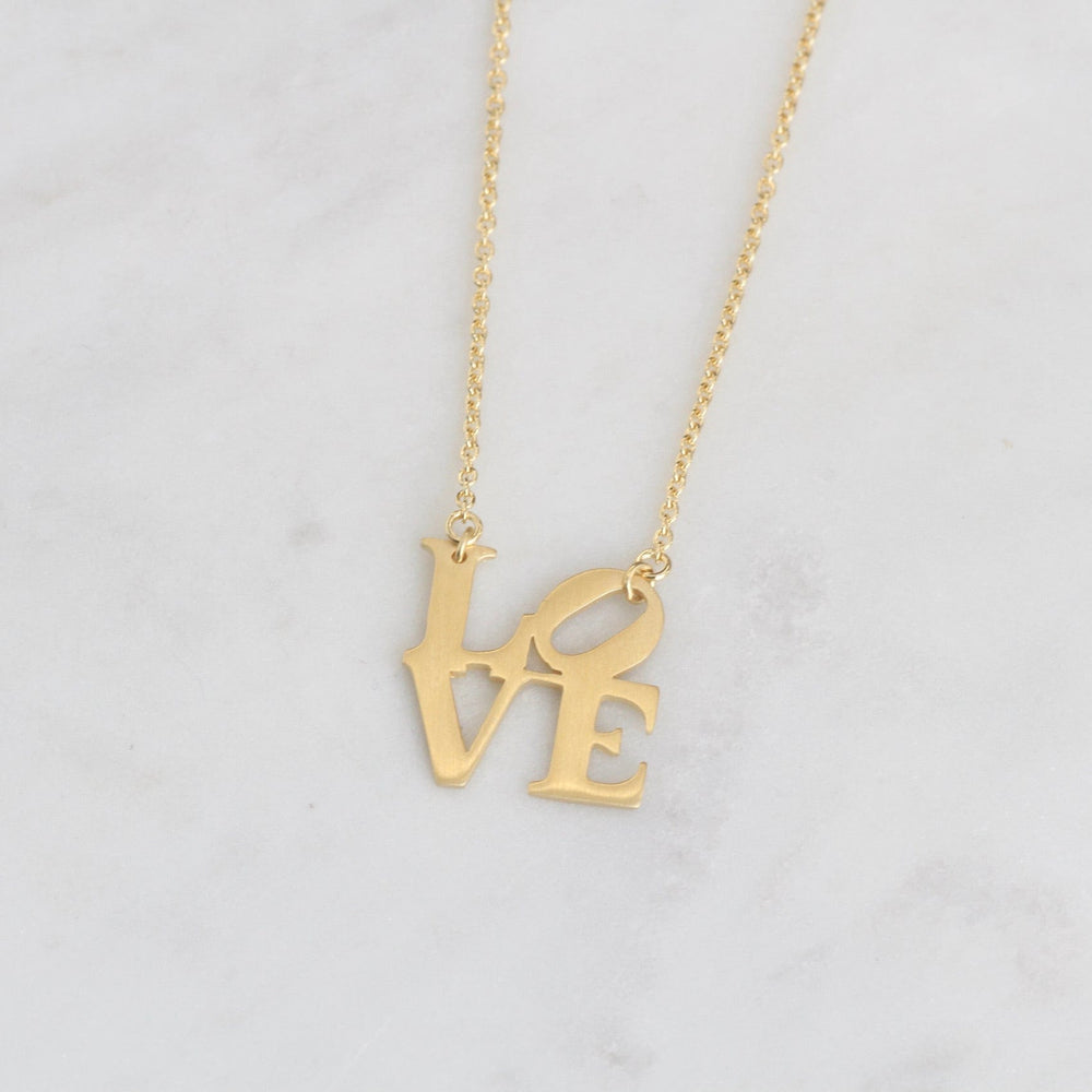 
                  
                    NKL-VRM Matte Gold Vermeil LOVE Sculpture Necklace
                  
                