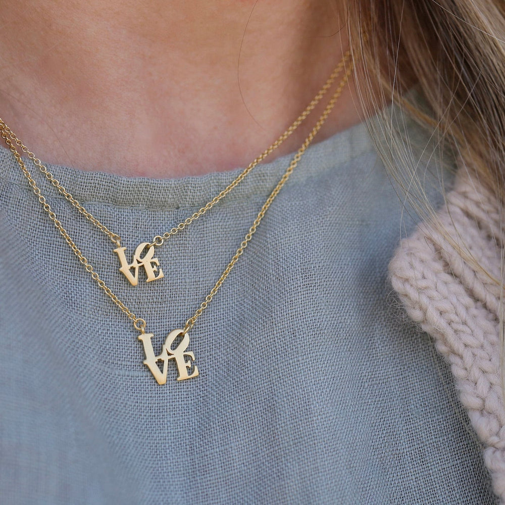 
                      
                        NKL-VRM Matte Gold Vermeil Mini LOVE Necklace
                      
                    