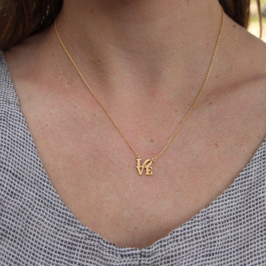 
                  
                    NKL-VRM Matte Gold Vermeil Mini LOVE Sculpture Necklace
                  
                