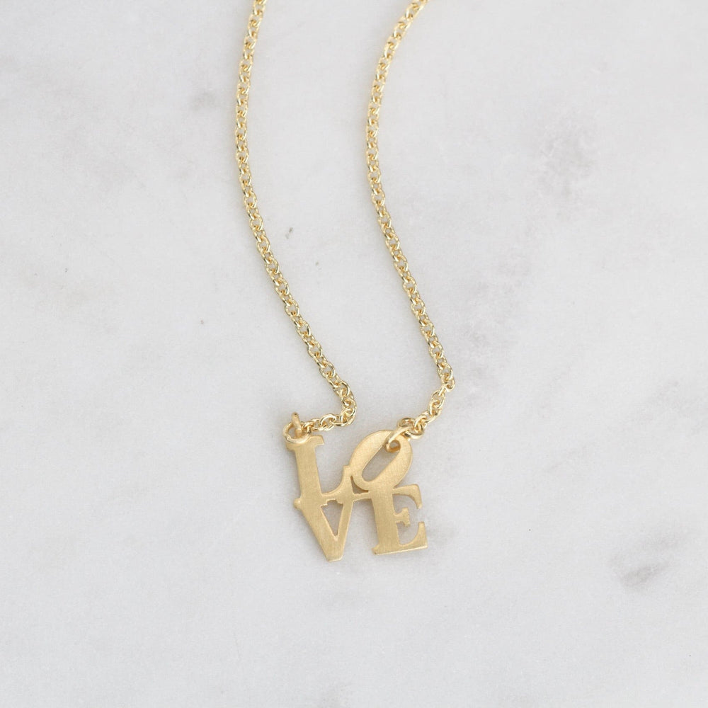 
                      
                        NKL-VRM Matte Gold Vermeil Mini LOVE Sculpture Necklace
                      
                    