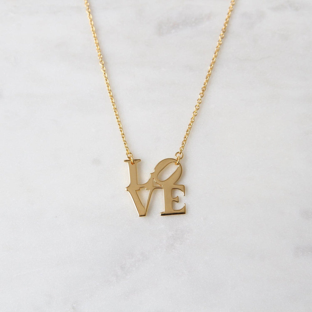 
                  
                    NKL-VRM Polished Gold Vermeil LOVE Sculpture Necklace
                  
                