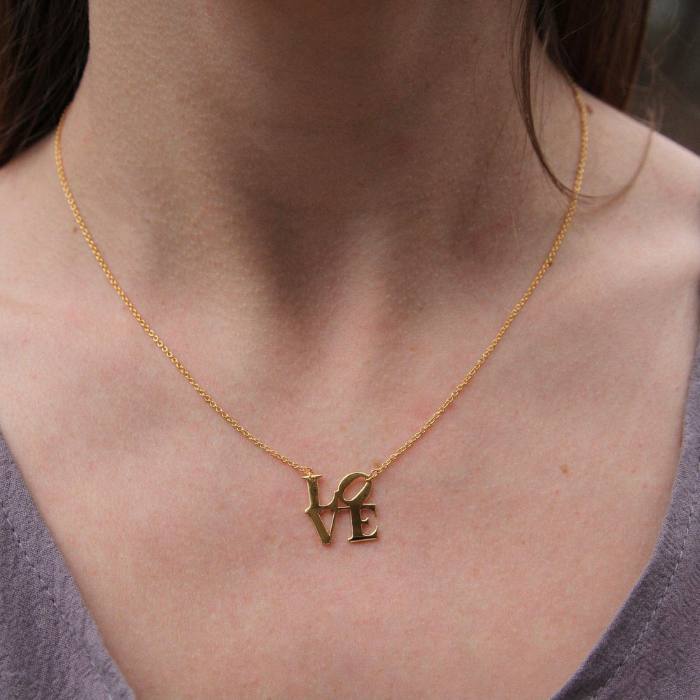 
                  
                    NKL-VRM Polished Gold Vermeil LOVE Sculpture Necklace
                  
                