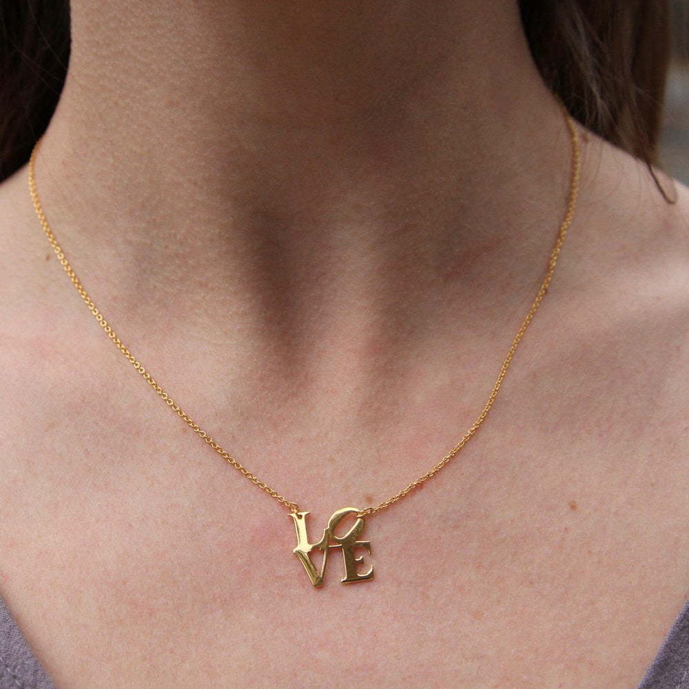 
                      
                        NKL-VRM Polished Gold Vermeil LOVE Sculpture Necklace
                      
                    