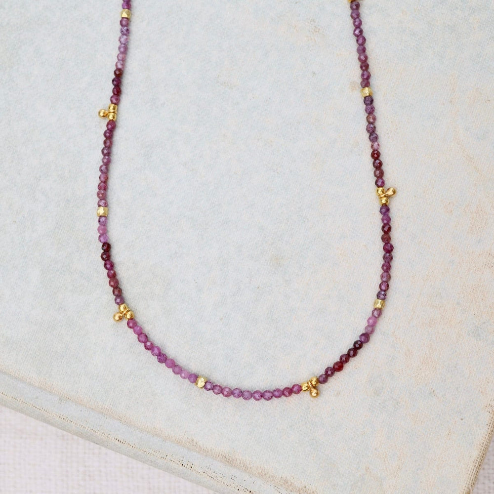 
                      
                        NKL-VRM Ruby, 24kt Vermeil Charms & Beads Necklace
                      
                    