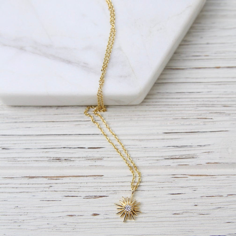 
                  
                    NKL-VRM Sunburst with Center CZ Necklace - 14k Gold Vermei
                  
                