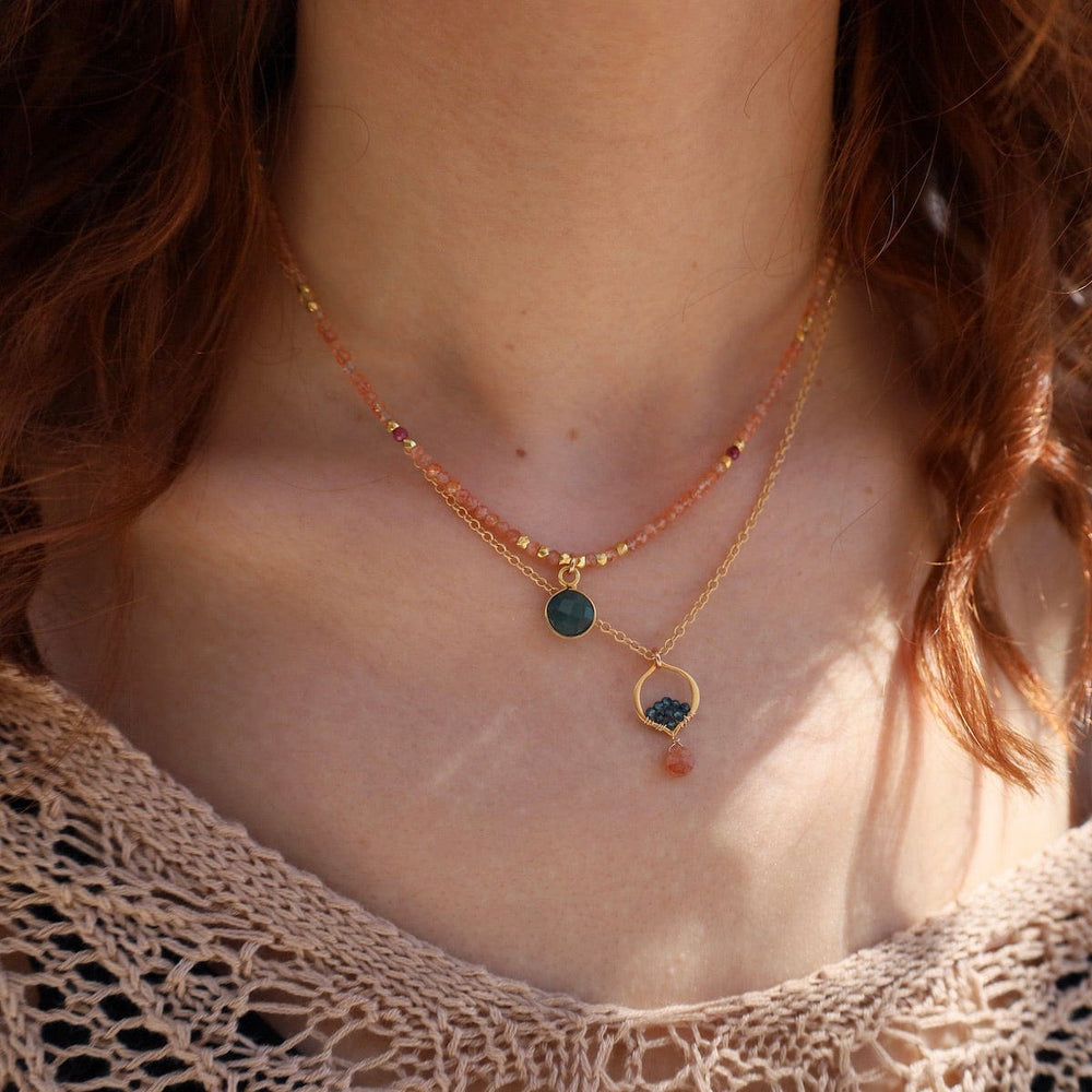 
                      
                        NKL-VRM Tiny Arabesque Necklace with Sunstone
                      
                    