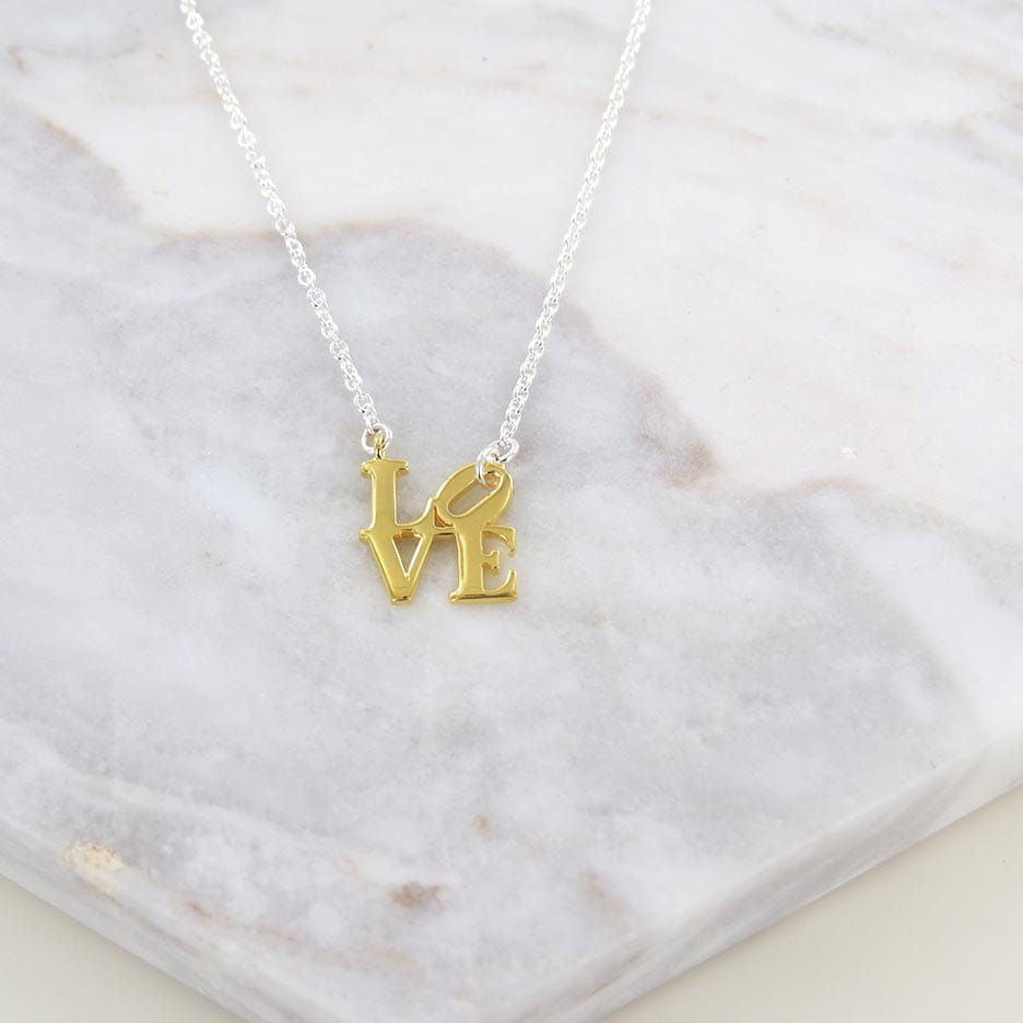 
                  
                    NKL-VRM Two Tone Gold Vermeil & Silver Polished Mini LOVE Sculpture Necklace
                  
                