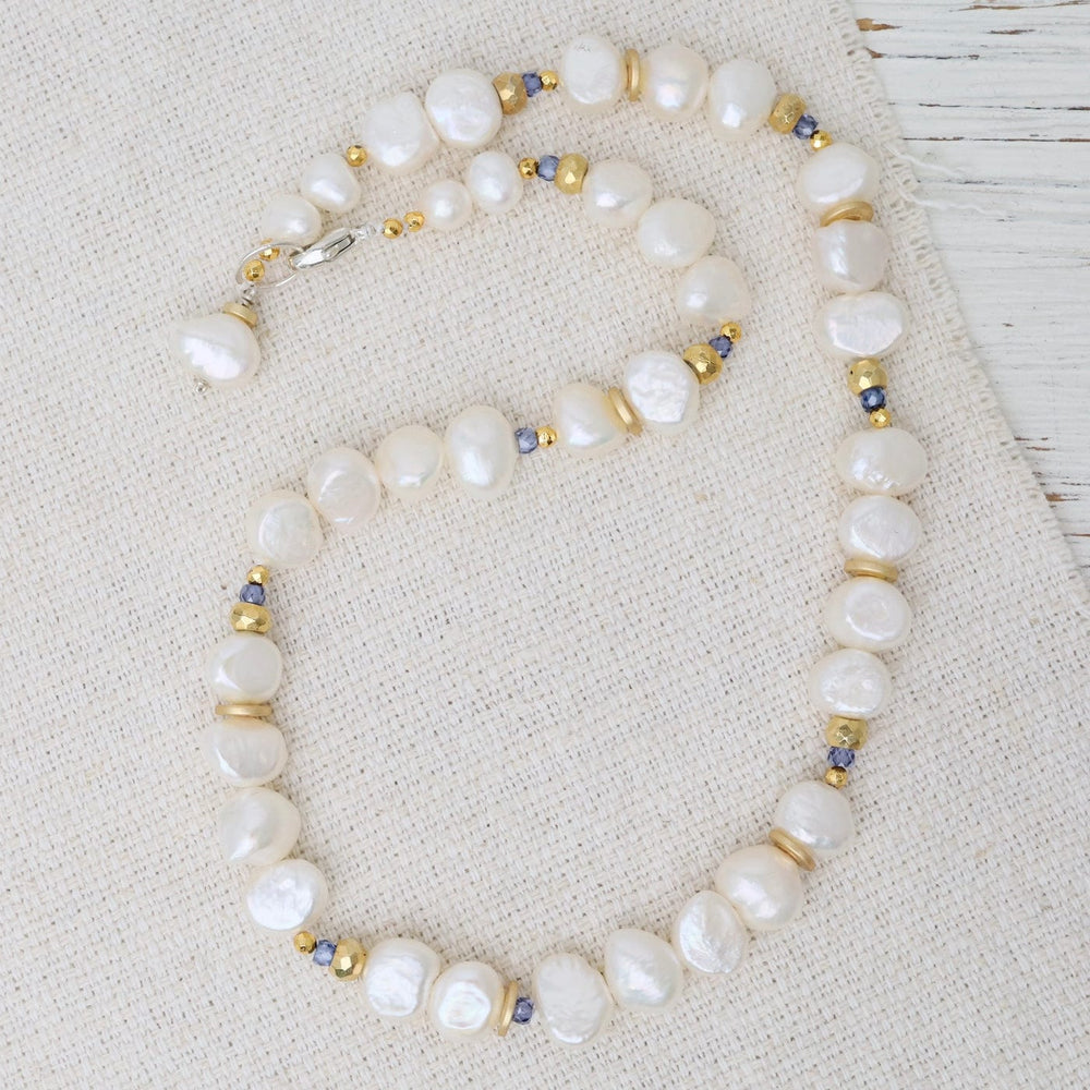 
                  
                    NKL White Pearl Iolite Station Necklace
                  
                