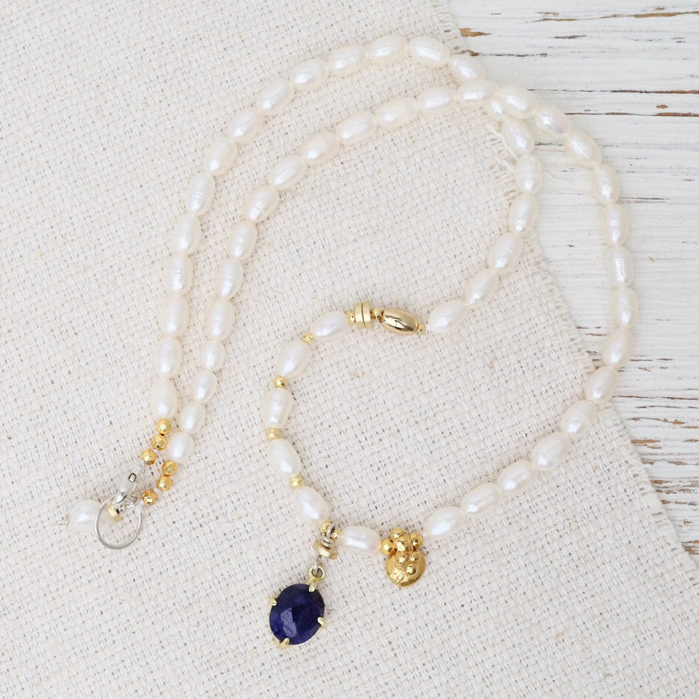 
                  
                    NKL White Pearl with Lapis Necklace
                  
                