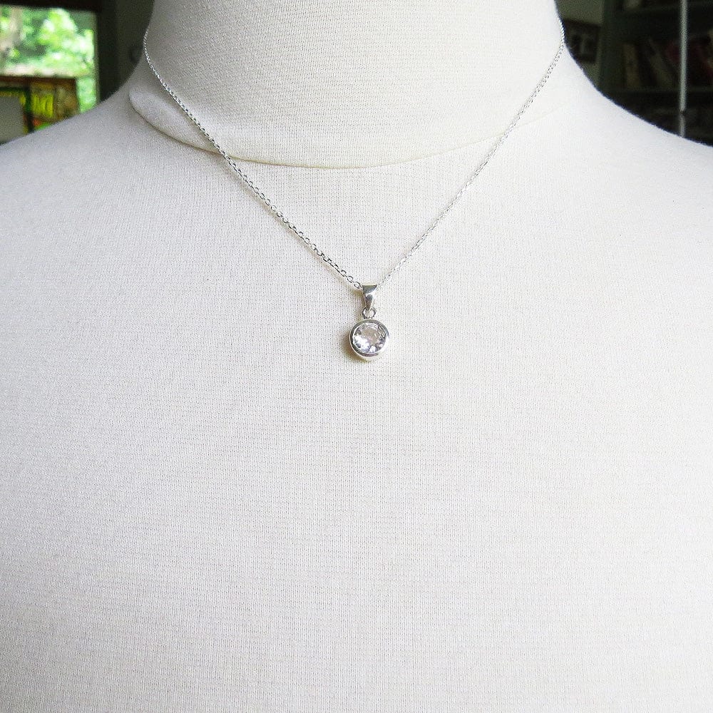 
                      
                        NKL White Topaz Dot Pendant
                      
                    