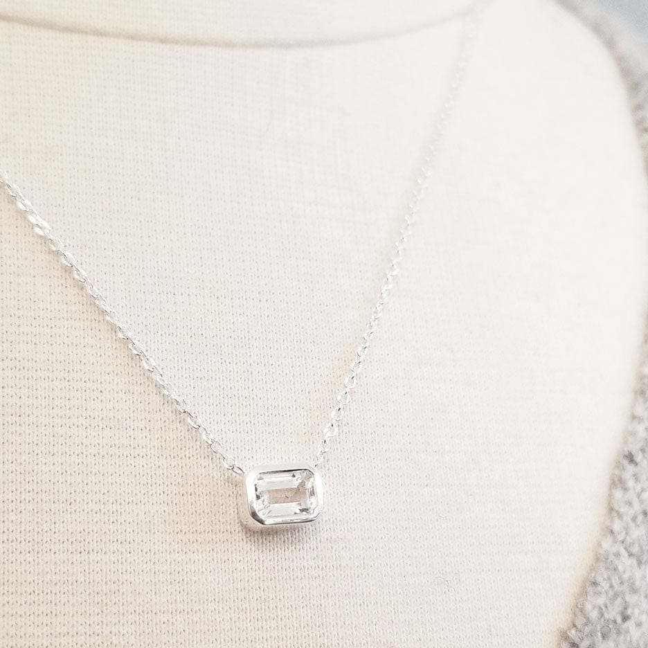 
                      
                        NKL White Topaz Solitaire Necklace
                      
                    