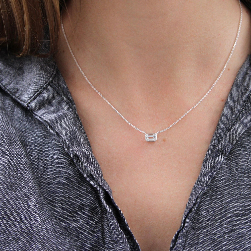 
                      
                        NKL White Topaz Solitaire Necklace
                      
                    