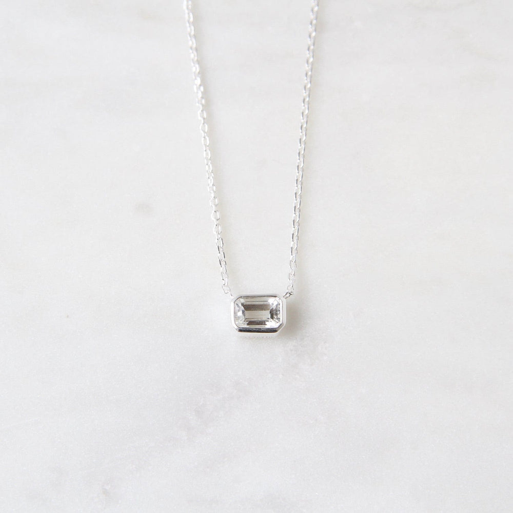 
                      
                        NKL White Topaz Solitaire Necklace
                      
                    