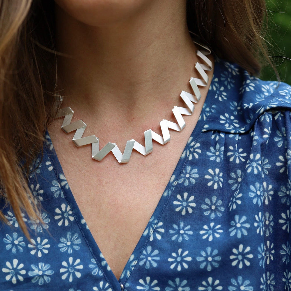 
                      
                        NKL Zig Zag Necklace
                      
                    