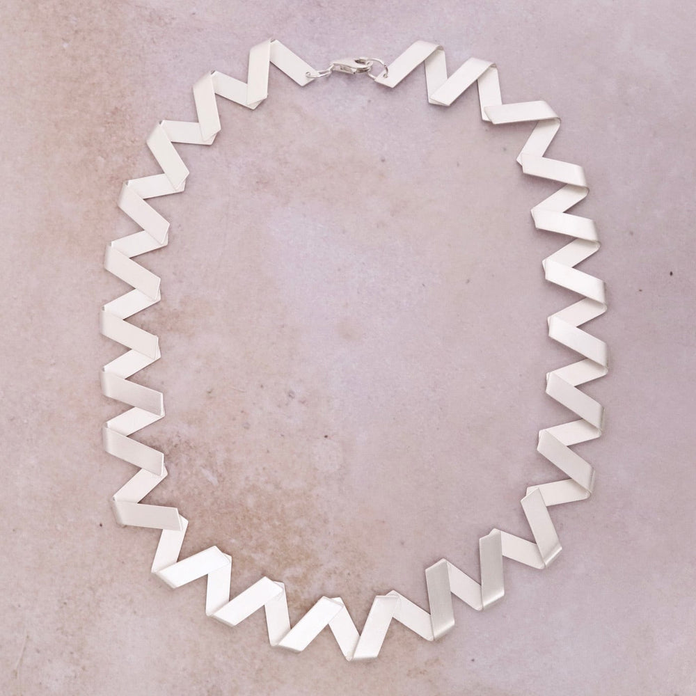 
                      
                        NKL Zig Zag Necklace
                      
                    