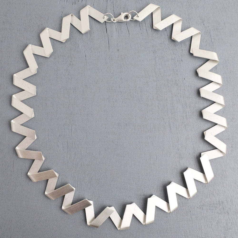 
                      
                        NKL Zig Zag Necklace
                      
                    