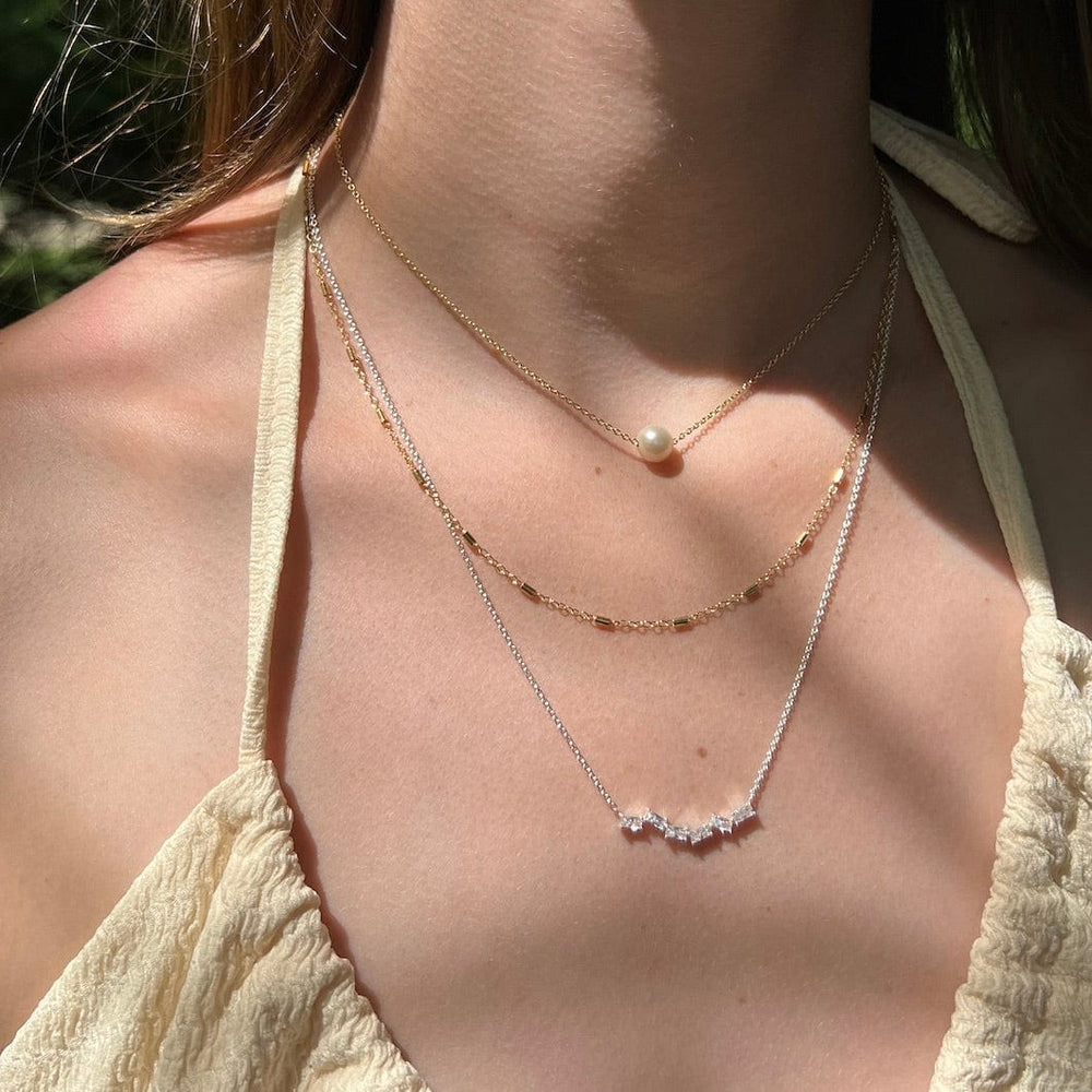 
                      
                        NKL Zig Zag Scattered Baguette Necklace
                      
                    