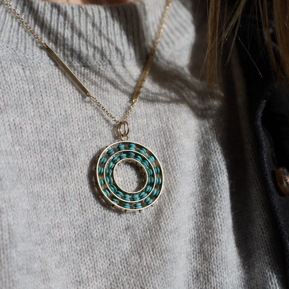 
                  
                    PND-14K Persian Turquoise Concentric Pendant
                  
                