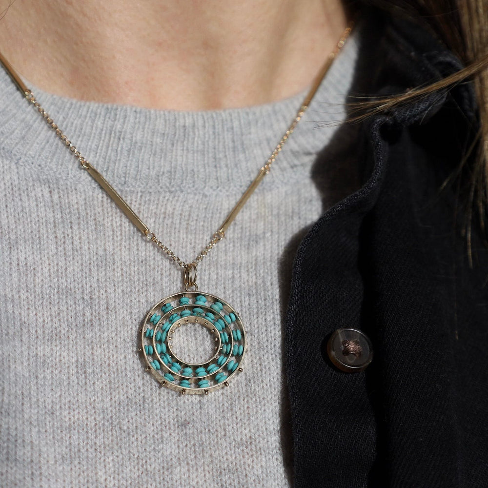 
                  
                    PND-14K Persian Turquoise Concentric Pendant
                  
                