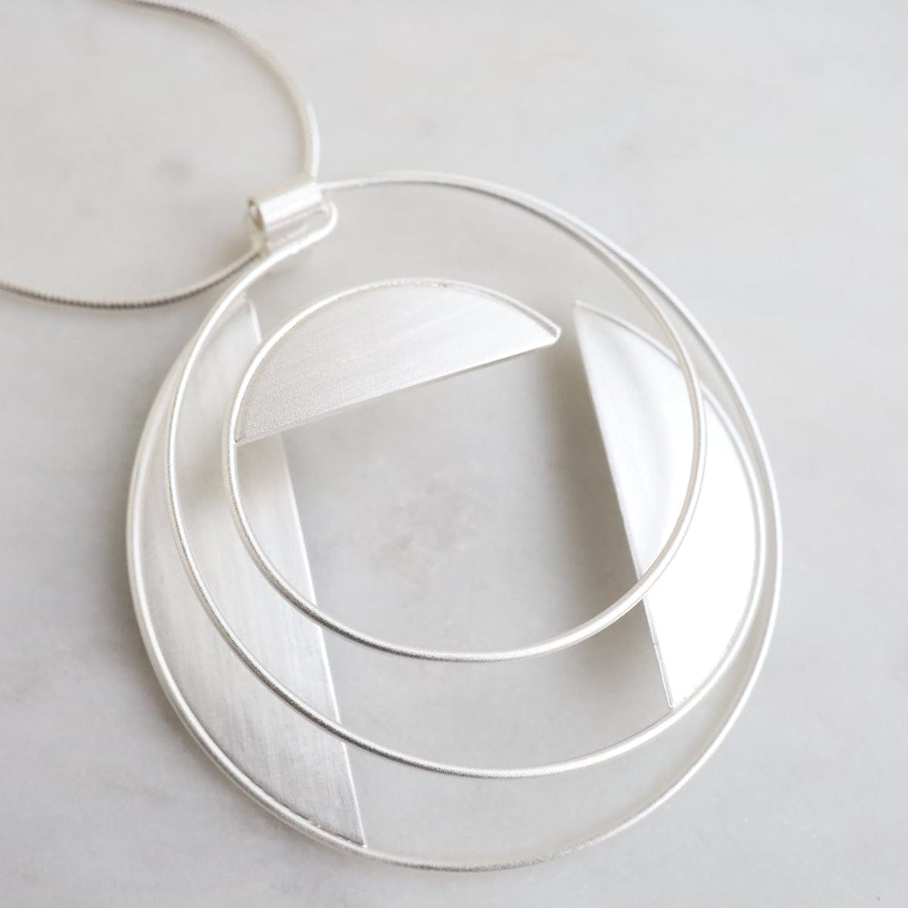 
                      
                        PND Half Moon Geometric Pandant Necklace
                      
                    