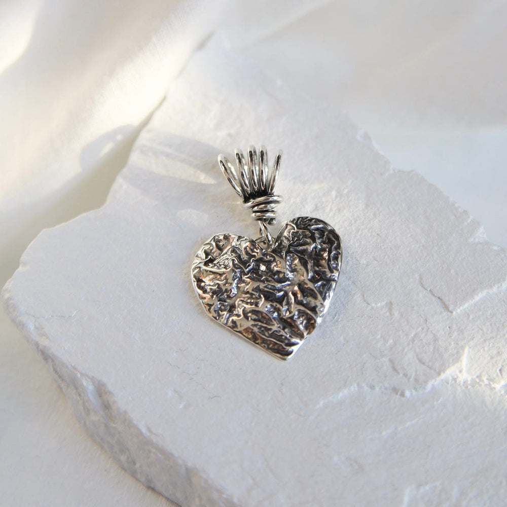 
                      
                        PND Reticulated Heart Pendant on Vine Bail
                      
                    