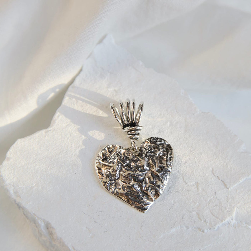 
                      
                        PND Reticulated Heart Pendant on Vine Bail
                      
                    