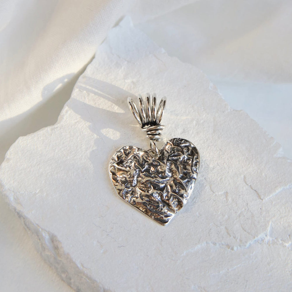 
                      
                        PND Reticulated Heart Pendant on Vine Bail
                      
                    