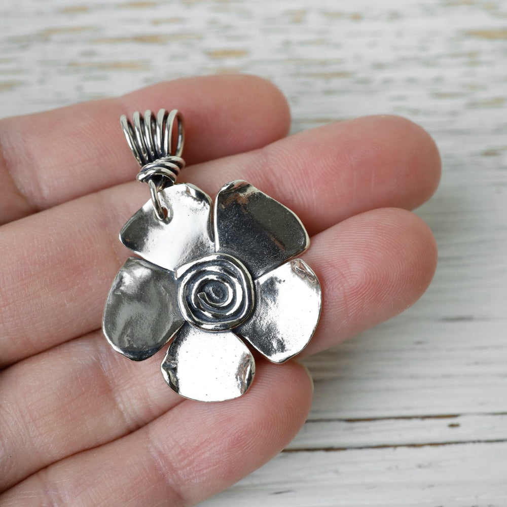 
                      
                        PND Spiral Flower Pendant
                      
                    