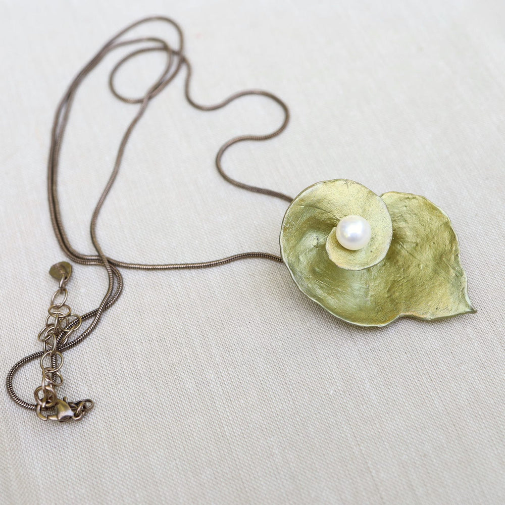 
                  
                    PND Spiral Geranium Long Pendant
                  
                