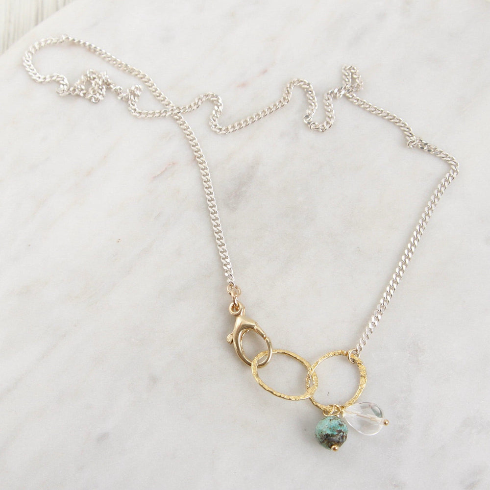 
                  
                    PND Sterling Silver & Gold Filled Rings Necklace with Turquoise & Quartz
                  
                