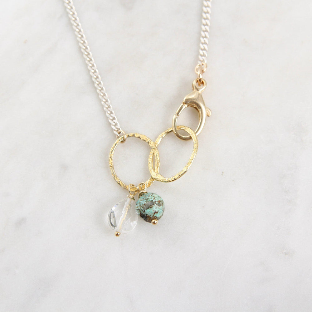 
                  
                    PND Sterling Silver & Gold Filled Rings Necklace with Turquoise & Quartz
                  
                