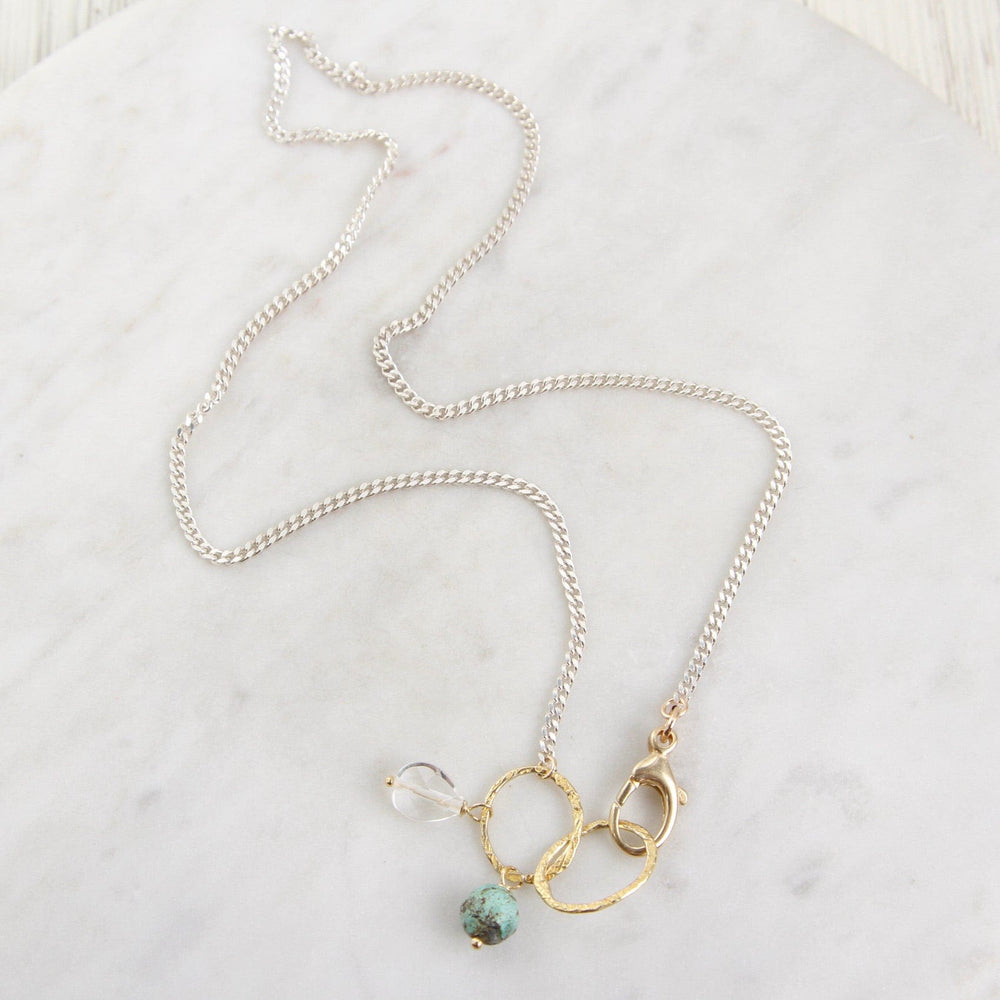 
                  
                    PND Sterling Silver & Gold Filled Rings Necklace with Turquoise & Quartz
                  
                