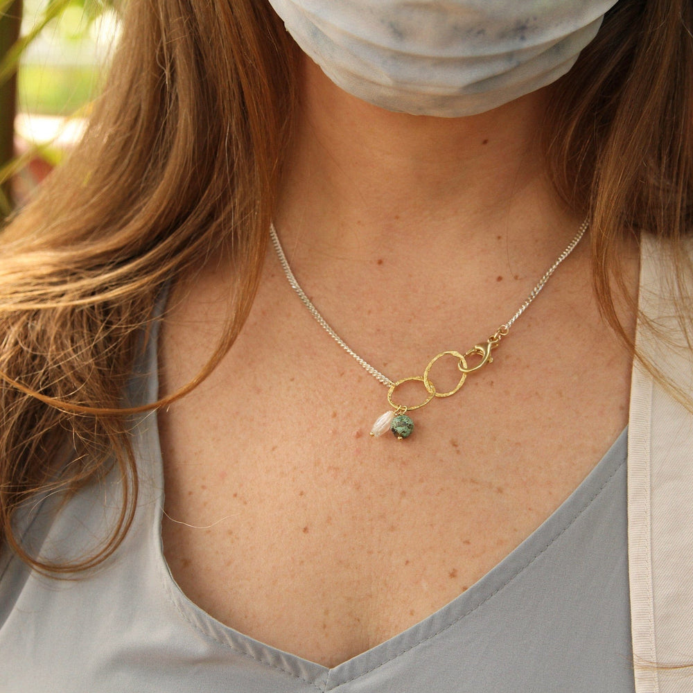 
                  
                    PND Sterling Silver & Gold Filled Rings Necklace with Turquoise & Quartz
                  
                