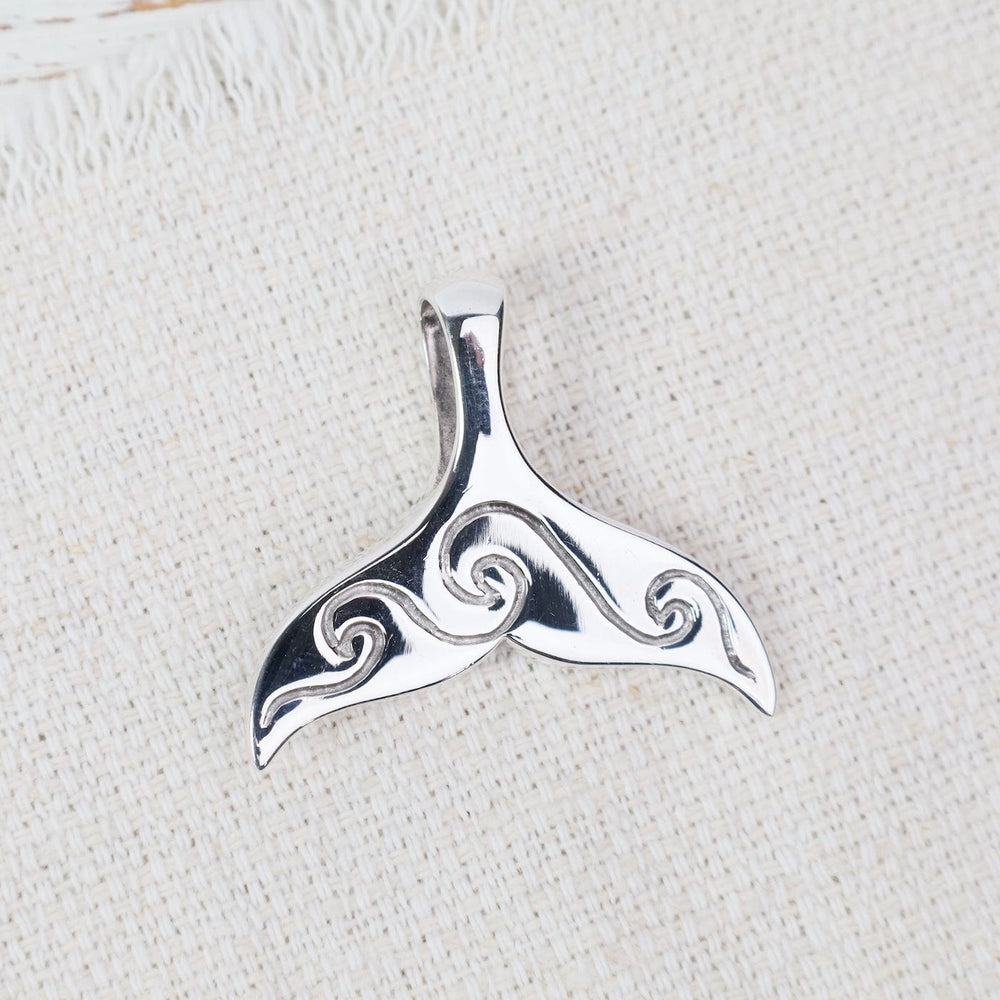 
                  
                    PND Sterling Silver Large Whale Tail with Mother Of Pe
                  
                