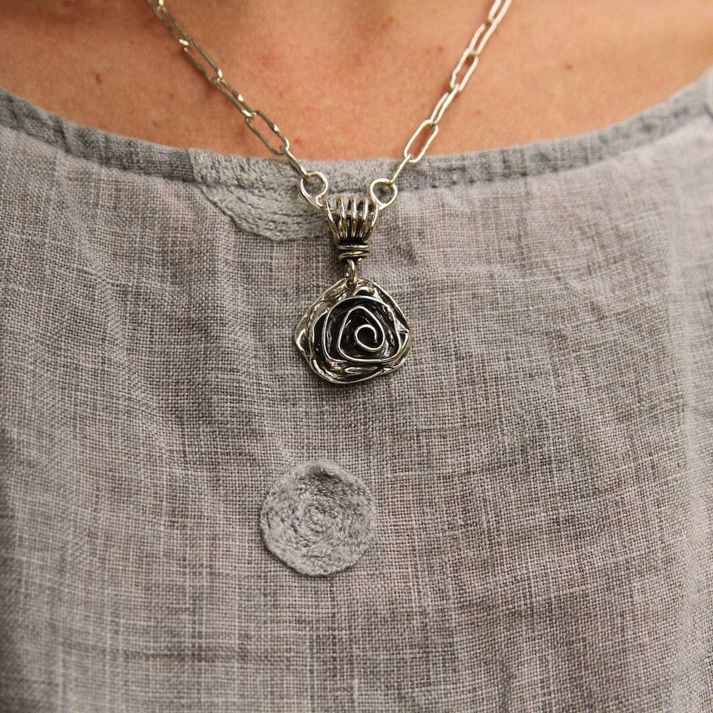 
                      
                        PND Sterling Silver Rose Pendant on Vine Bail
                      
                    