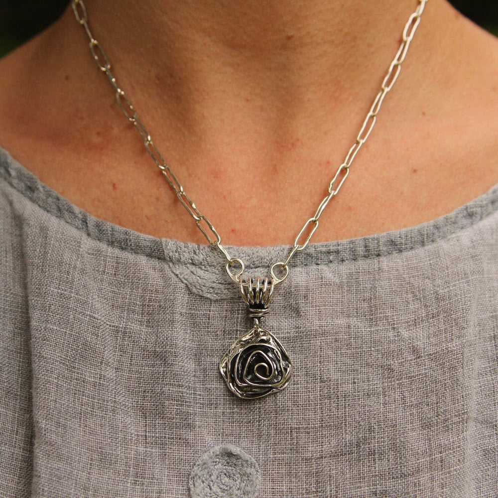 
                      
                        PND Sterling Silver Rose Pendant on Vine Bail
                      
                    