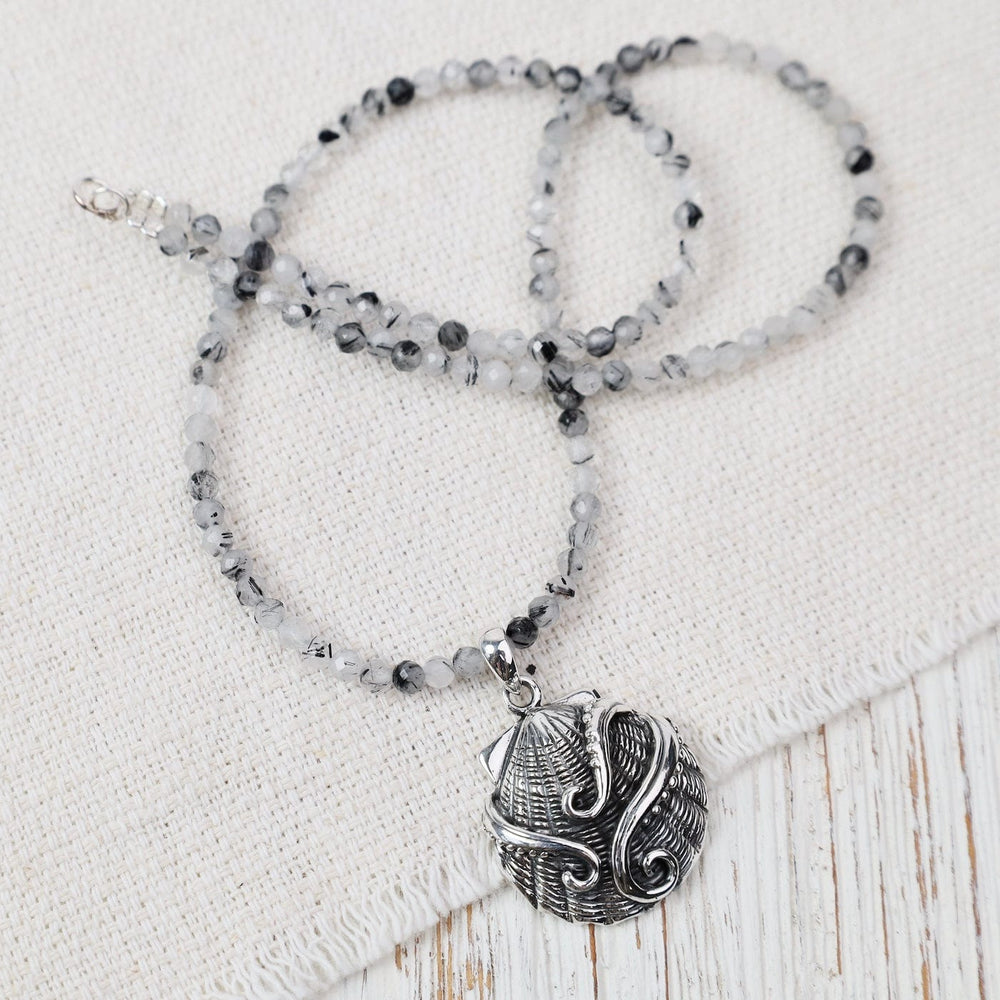 
                  
                    PND Sterling Silver Shell with Octopus Arms Pendant -
                  
                