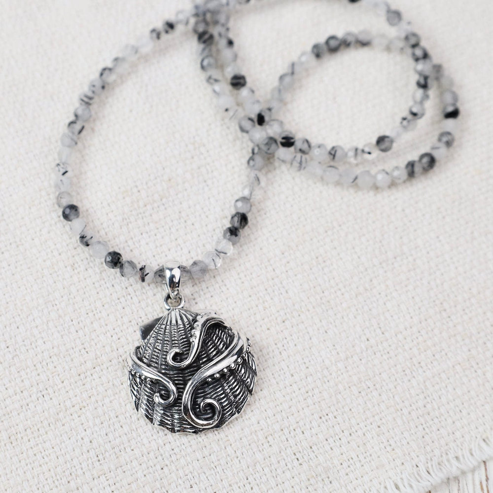 
                  
                    PND Sterling Silver Shell with Octopus Arms Pendant -
                  
                