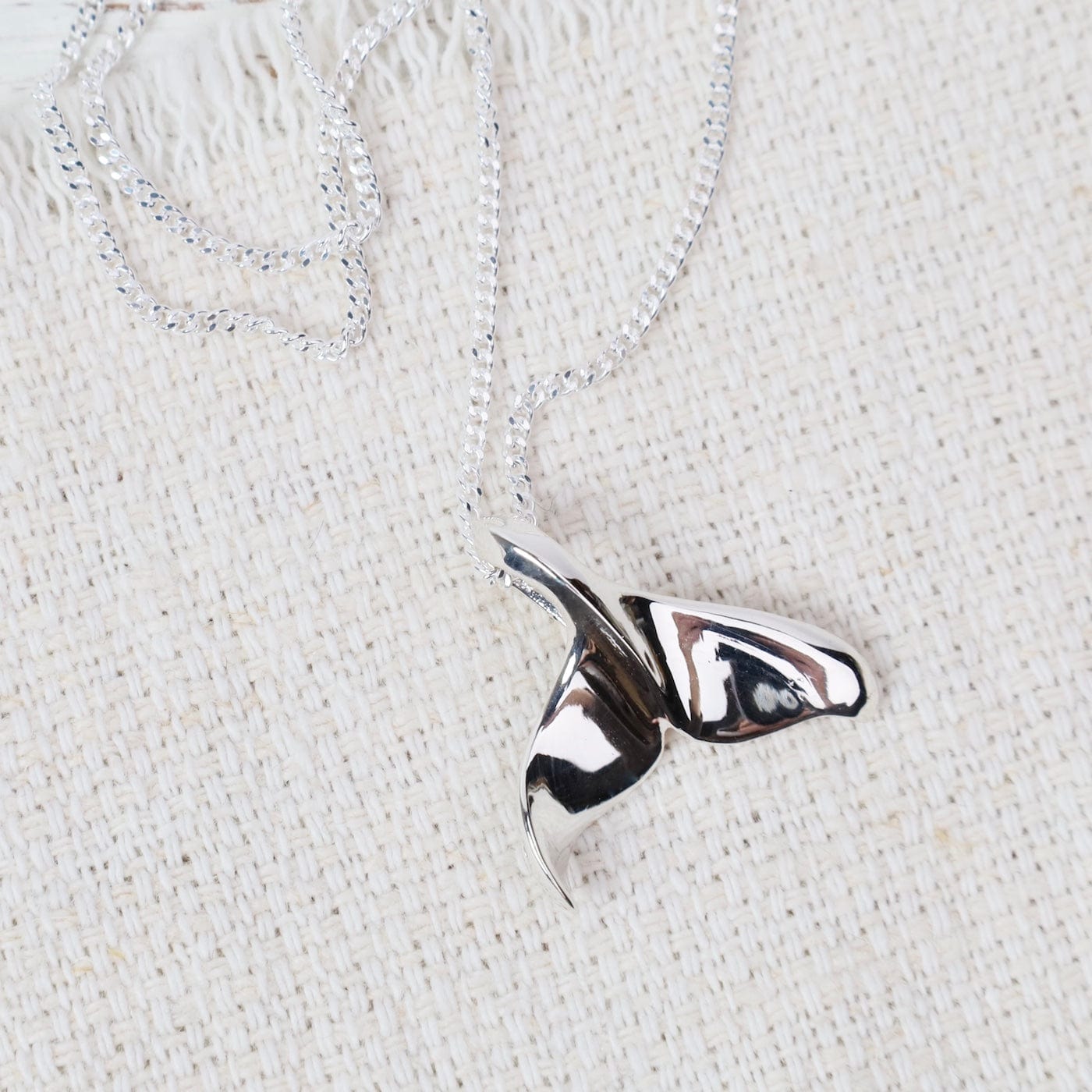PND Sterling Silver Small Whale Tail Pendant - On Curb