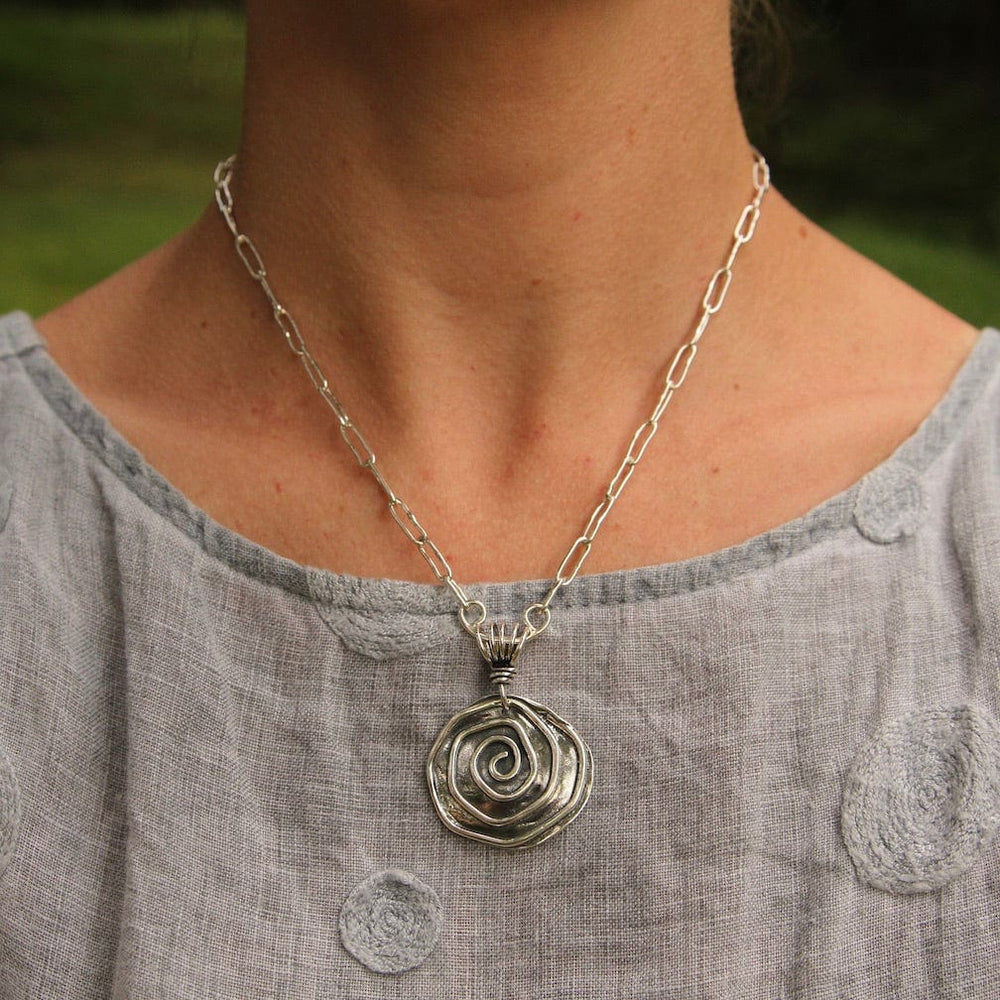 
                      
                        PND Sterling Silver Spiral Pendant on Vine Bail
                      
                    