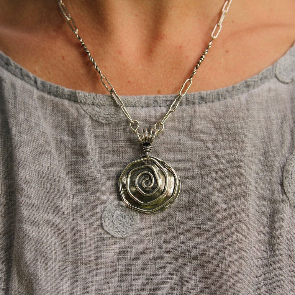 
                      
                        PND Sterling Silver Spiral Pendant on Vine Bail
                      
                    