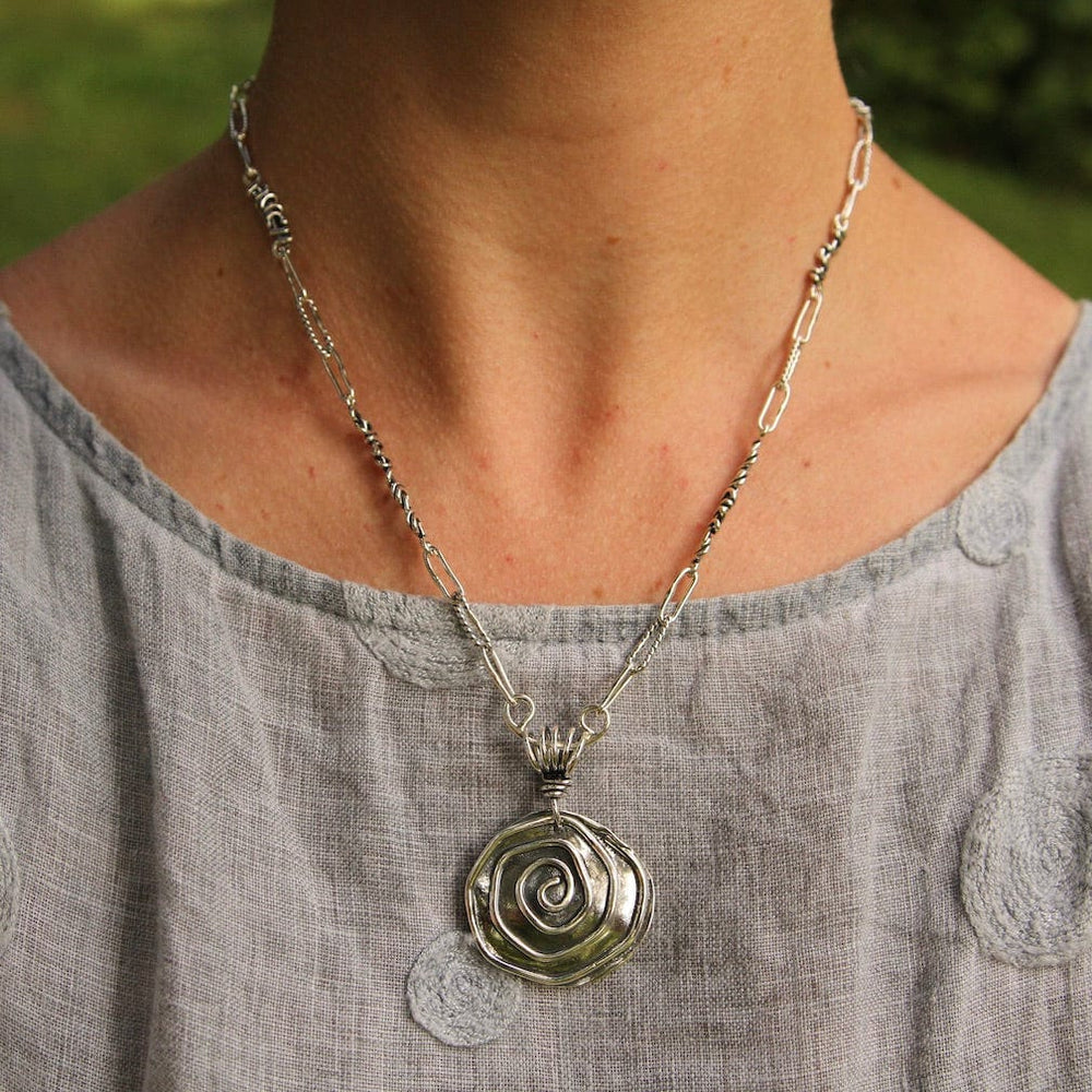 
                      
                        PND Sterling Silver Spiral Pendant on Vine Bail
                      
                    