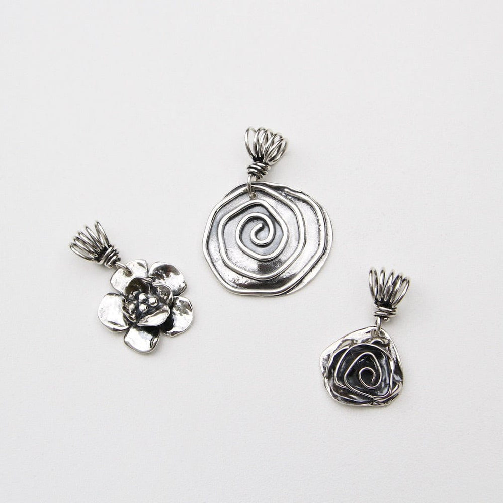 
                      
                        PND Sterling Silver Spiral Pendant on Vine Bail
                      
                    