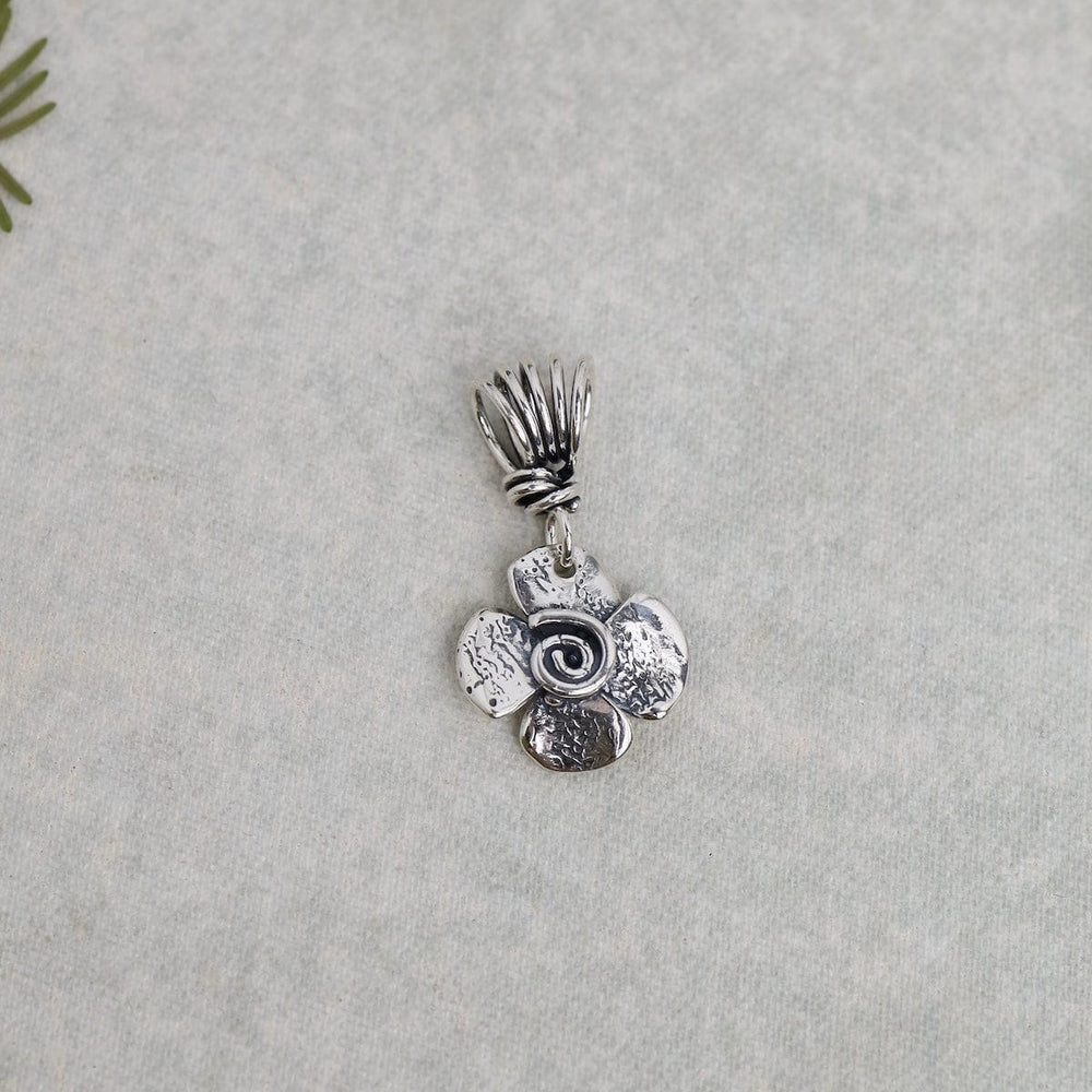 
                      
                        PND Two Sided Flower Pendant with Spiral on the Other
                      
                    