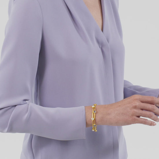 Load and play video in Gallery viewer, Milano 6 Stone Mother of Pearl Bangle - Large
